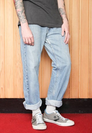 VINTAGE BLUE LEVI'S 501 RIPPED JEANS