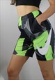 Vintage Nike Shorts in Multi Pattern with Tick Logo