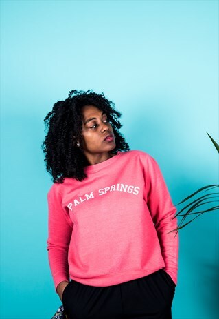 VINTAGE 1990S SWEATER IN PINK WITH A PALM SPRINGS PRINT