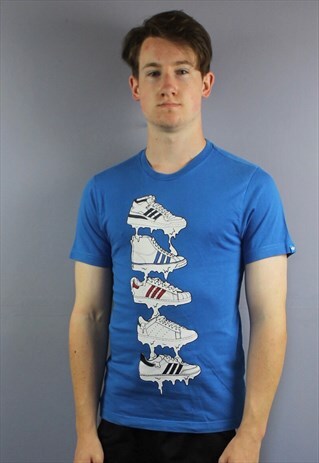 VINTAGE ADIDAS T SHIRT IN BLUE WITH PRINTED SHOE LOGOS. SIZE