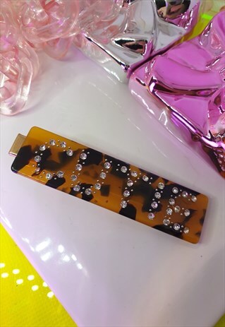 PEARL HAIRCLIP WITH DIAMANTE SLOGAN