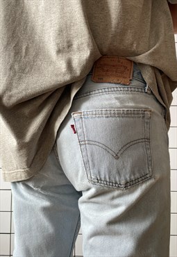Vintage LEVIS 501 Jeans Distressed Denim 90s Light Wash 