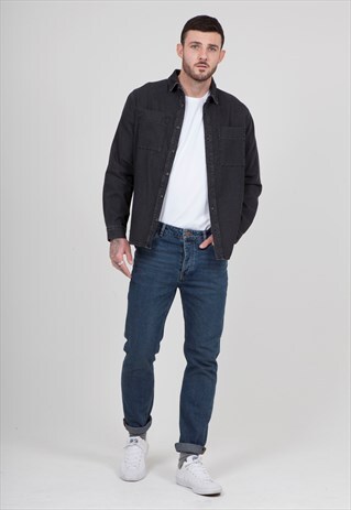 TAPERED JEANS IN MID WASH