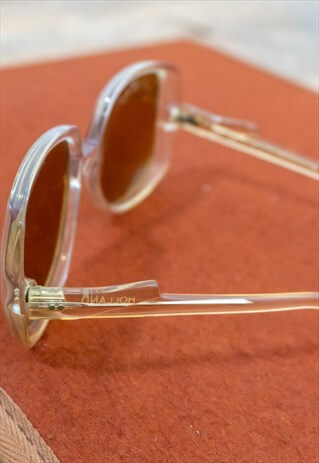 VINTAGE POLAROID SUNGLASSES IN YELLOW