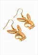 Gold playboy bunny drop down earrings