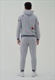 HOODED TRACKSUIT IN GREY MARL WITH FLOWERS