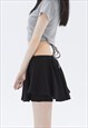 PLEATED MINI SKIRT IN BLACK