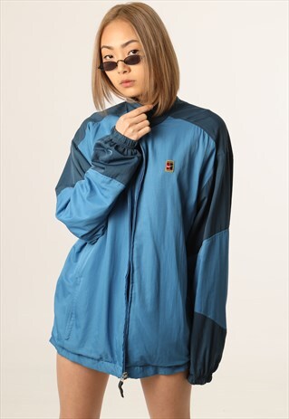 VINTAGE NIKE WINDBREAKER FESTIVAL JACKET