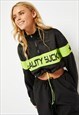 SKINNYDIP LONDON REALITY SUCKS HALF ZIP SWEATSHIRT IN BLACK