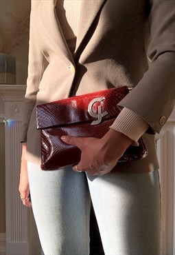 Vintage 'Mangiameli' snake embossed leather clutch in red.