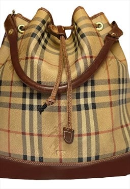 Bucket bag with adjustable drawstring in brown coated canvas
