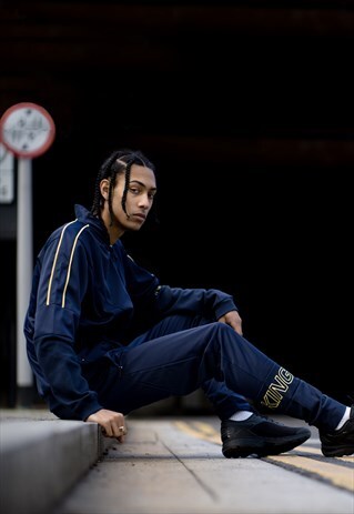 EARLHAM TRACKSUIT PANTS IN BLUE WITH YELLOW EMBROIDERY