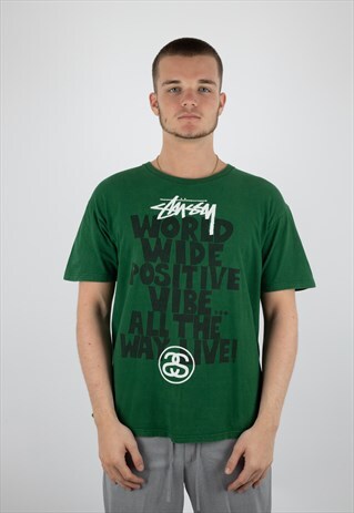 STUSSY 90'S WORLD WIDE POSITIVE VIBE GRAPHIC TEE IN GREEN