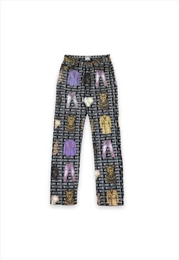 Moschino vintage 90s repeat spell out clothes print trousers
