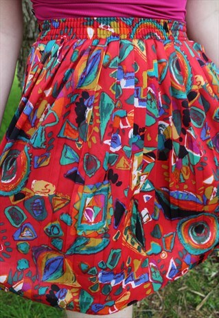 VINTAGE 80'S RED RAINBOW GEOMETRIC FESTIVAL PLEATED SKIRT