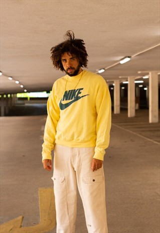 VINTAGE 80'S / 90'S NIKE SPELLOUT SWEATSHIRT IN YELLOW