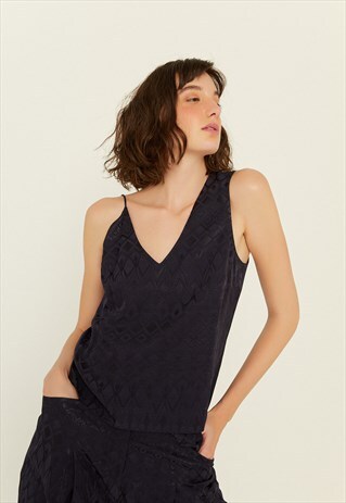 PATTERN BLOUSE WITH AN ASYMMETRIC SHOULDERS