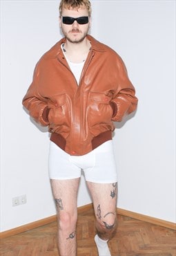 Vintage 90s faux leather bomber jacket in fire orange