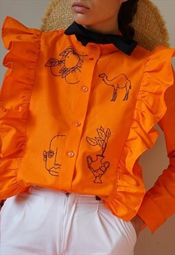 Hand embroidered orange cowboy shirt with ruffles