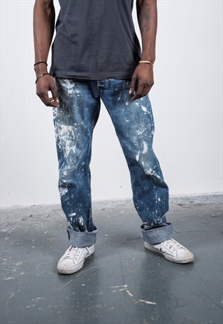VINTAGE BLUE LEVI'S PAINT JEANS