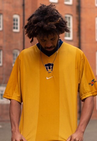 VINTAGE NIKE U.N.A.M FOOTBALL SHIRT IN GOLD
