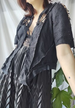 The upcycled black cotton corset deconstructed top