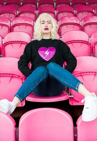 UNISEX JUMPER IN BLACK WITH SEQUIN HEART MOTIF IN PINK
