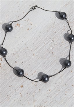 Deadstock charcoal chain necklace with big pearls.