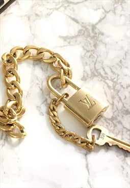 Authentic Louis Vuitton Padlock and Key with Bracelet
