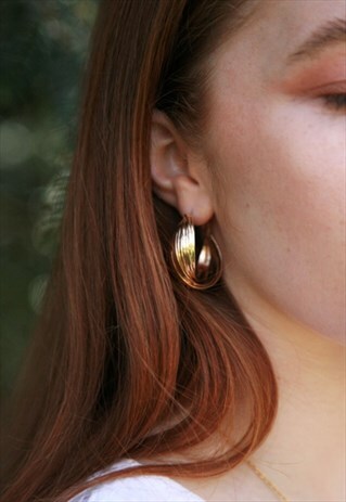 GOLD TWISTED HOOP EARRINGS