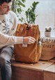 'THE TRAVELLER' RECYCLED LAPTOP BACKPACK IN MUSTARD