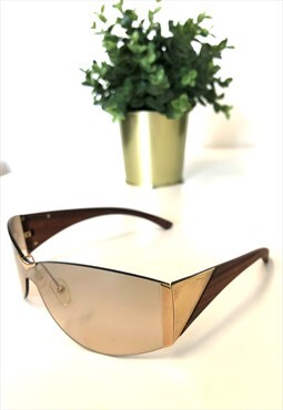 Alexander McQueen's AMQ 4004/S Rimless Teak Wood Sunglasses