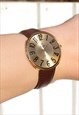 Classic Numbered Gold Watch
