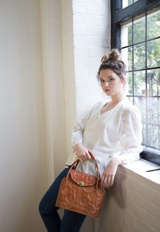 TAN LEATHER EMBOSSED HANDHELD BAG