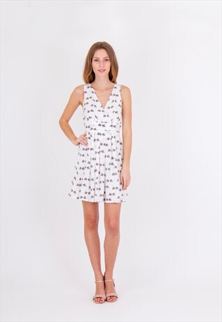 PLUNGE V NECK SLEEVELESS FLORAL PRINT PLEATED MINI DRESS