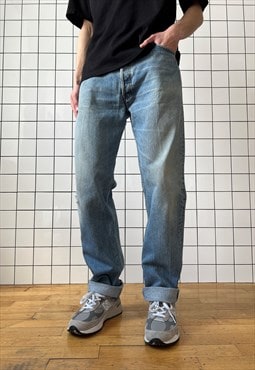 Vintage LEVIS 501 Jeans Distressed Denim 90s Washed Blue