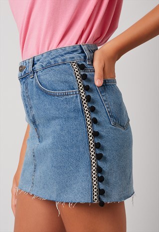 EXCLUSIVE SIDE POMPON TRIM RAW EDGED DENIM SKIRT