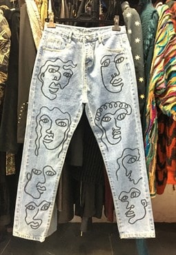 High waisted jeans in blue with multi faces