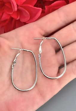 Silver Coloured Oval Hoop Earrings