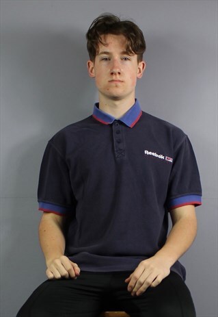 VINTAGE REEBOK POLO SHIRT IN NAVY WITH EMBROIDERED LOGO AND