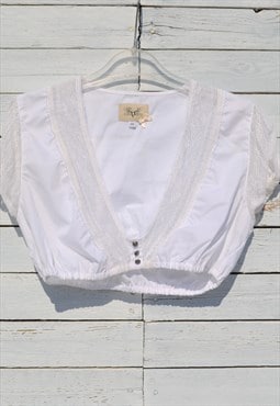 Vintage cotton short sleeved crop top with lace details.