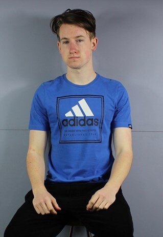 VINTAGE ADIDAS T-SHIRT IN BLUE WITH PRINTED LOGO. SIZE XS.