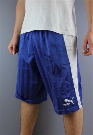 VINTAGE PUMA BASKETBALL SHORTS IN BLUE WITH POCKETS AND EMBR