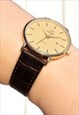 CLASSIC STYLE GOLD WATCH WITH DATE