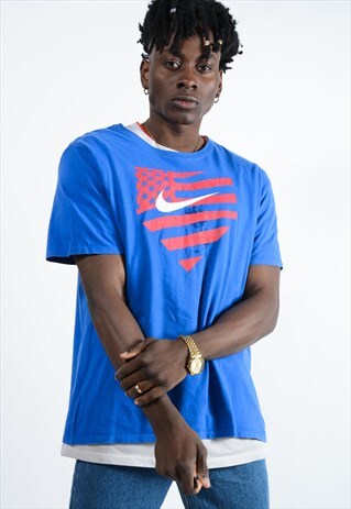 VINTAGE NIKE TEE SHIRT IN BLUE WITH GRAPHIC LOGO.