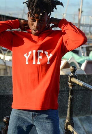 LONG SLEEVE POLO TOP IN RED WITH SPELL OUT LOGO.