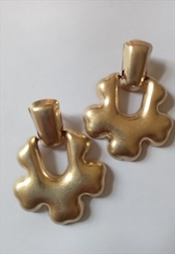Gold tone statement earrings 