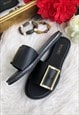 BLACK BUCKLED GLITTER JELLY SANDALS