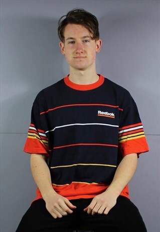 VINTAGE REEBOK ATHLETIC DEPARTMENT T-SHIRT IN ORANGE AND NAV