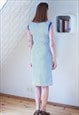 WHITE SLEEVELESS DRESS WITH BLUE DOTS